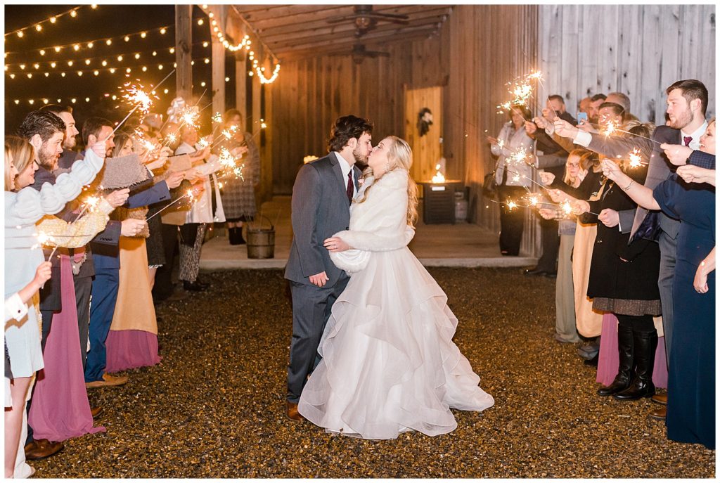 photographer captures sparkler exit at rustic pine farms wedding