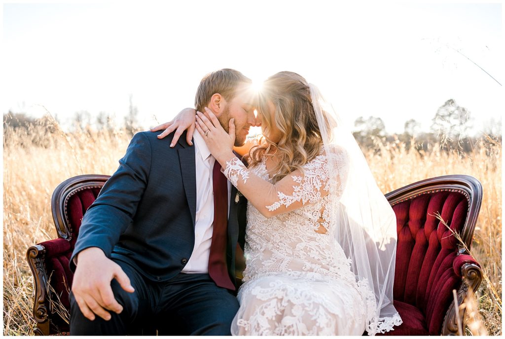 Albertville photographer captures bride and groom on couch.
